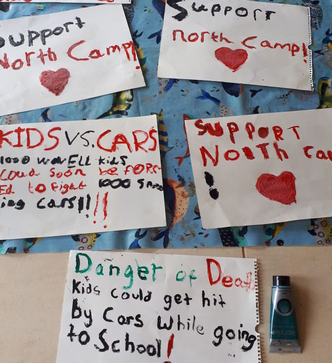 Children's art work supporting North Camp
